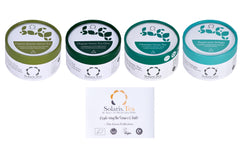 Vier Teedosen der Grüntee Collection: Jasmin Grüntee, Grüntee Chai, ChunMe Grüntee und Peppermnt Delight in Aufsicht